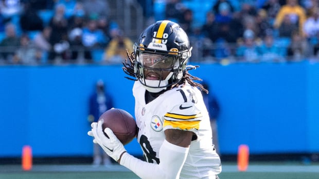 Dec 18, 2022; Charlotte, North Carolina, USA; Pittsburgh Steelers wide receiver Diontae Johnson (18) with the ball in the third quarter at Bank of America Stadium.